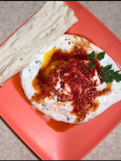 A picture of Chilbeesh (Çılbır🇹🇷) Turkish poached eggs.