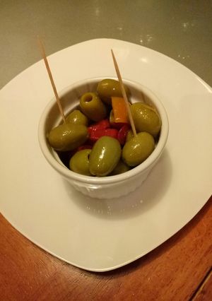 A picture of Olives with peppers.