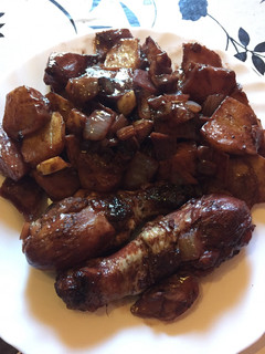 Una foto de Pollo al vino tinto