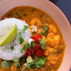 Thai red prawn curry with sticky rice A picture of Thai red prawn curry with sticky rice.
