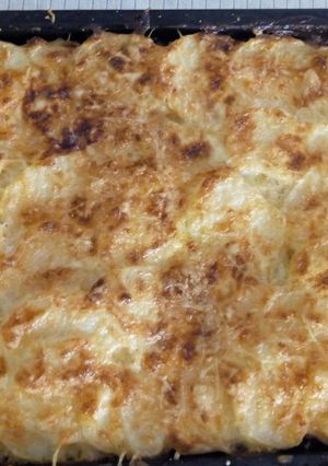 Una foto de Papas con crema y queso de mi mamá