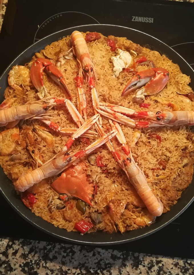 Una foto de Arroz con cangrejo azul