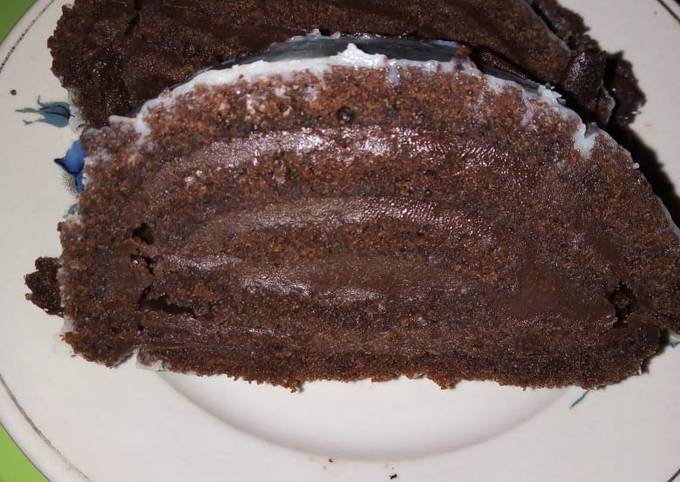 Chocolate roll cake with chocolate buttercream frosting