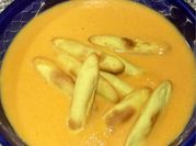 Una foto de crema de zanahoria leche evaporada