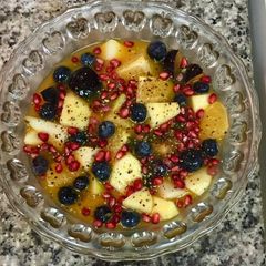 A picture of Fruit Salad In Orange 🍊 Juice.