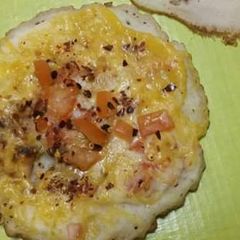 A picture of Cheesey tomato pitha.
