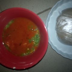 A picture of Okro with beef stew and Eba.