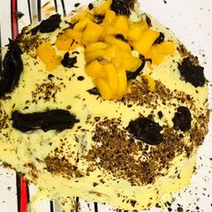 A picture of Pull me up mango cake with chocolate sponge.