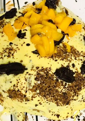 A picture of Pull me up mango cake with chocolate sponge.