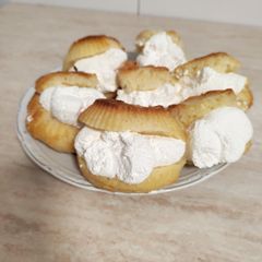 A picture of Romanian Muffins with wiping cream and Vanilla/ Rum Syrup (Savarine).