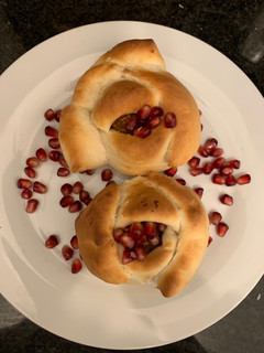 A picture of Dabeli Bun pav in Rose shape.