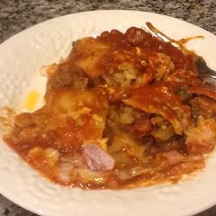 A picture of Ground meat enchiladas.