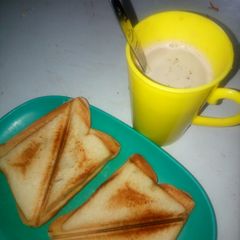 A picture of Tea and toasted bread.