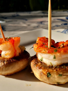 Una foto de Champiñón con langostino 🍄🟫🦐
