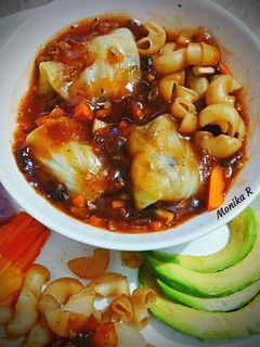 A picture of Mince Rolls in Chicken Munchow Soup.