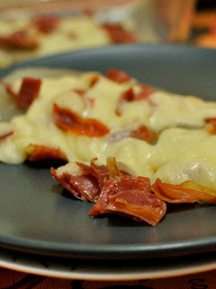 Una foto de Pencas de alcelgas con jamón y queso al horno