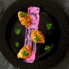 A picture of Vegetables Masala Khichdi With Pomogranate Curd.
