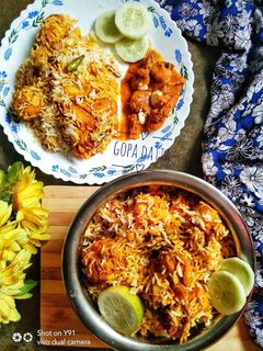 চিকেন দম বিরিয়ানি (Chicken dum biriyani recipe in bengali) রেসিপির প্রধান ছবি