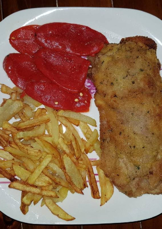 Una foto de Cachopo con patatas