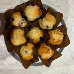 A picture of Lemon and blueberry drizzle muffins.