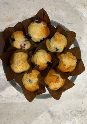 A picture of Lemon and blueberry drizzle muffins.