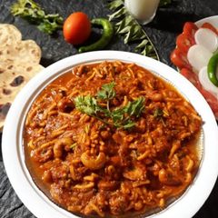 A picture of Dhaba Style kathiyavadi Kaju gathiya sabzi.
