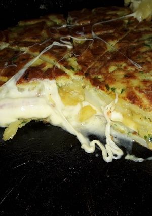 Una foto de Tortilla de papa rellena