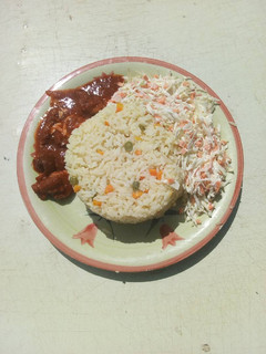 A picture of White rice and salad.