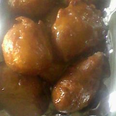 Kaimati coated with sugar syrup A picture of Kaimati coated with sugar syrup.