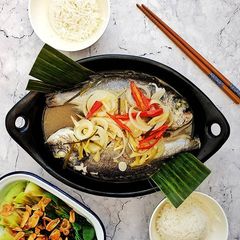 A picture of Asam or Steam fish in tamarind sauce.