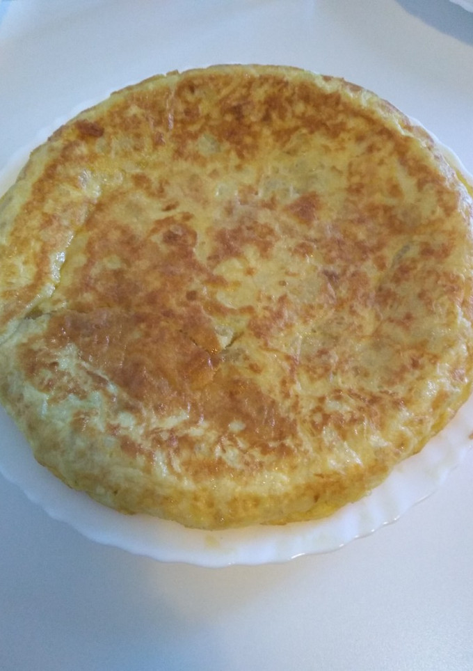 Una foto de Tortilla de patatas con cebolla