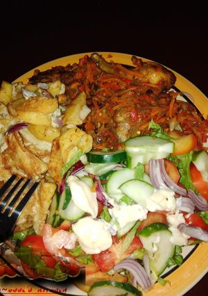 A picture of Irish with pepper chicken and salad.