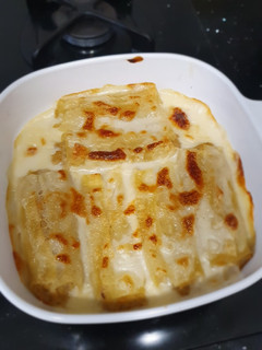 Una foto de Canelones de merluza