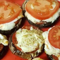 A picture of My Pizza style stuffed portobello mushrooms.