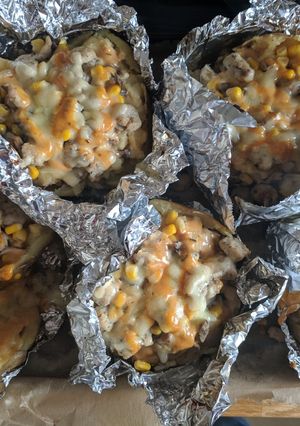 A picture of Jacket Potato with sausage mix.