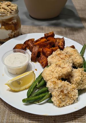 A picture of Southern Style Chicken Bites with Roasted Sweet Potatoes & Green Beans.
