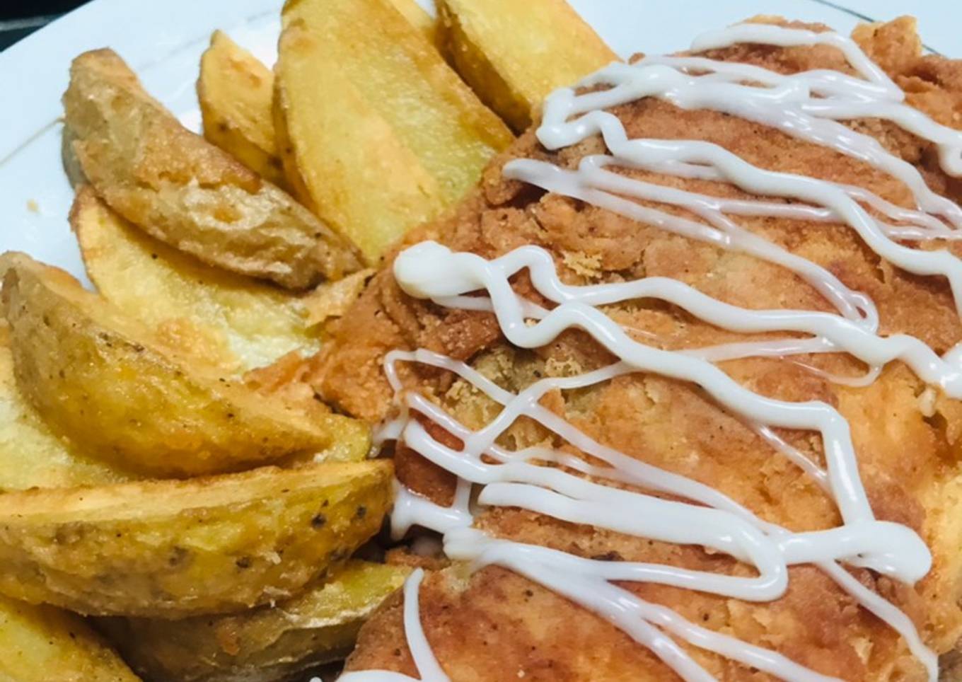Dory fish with potatoes wedges