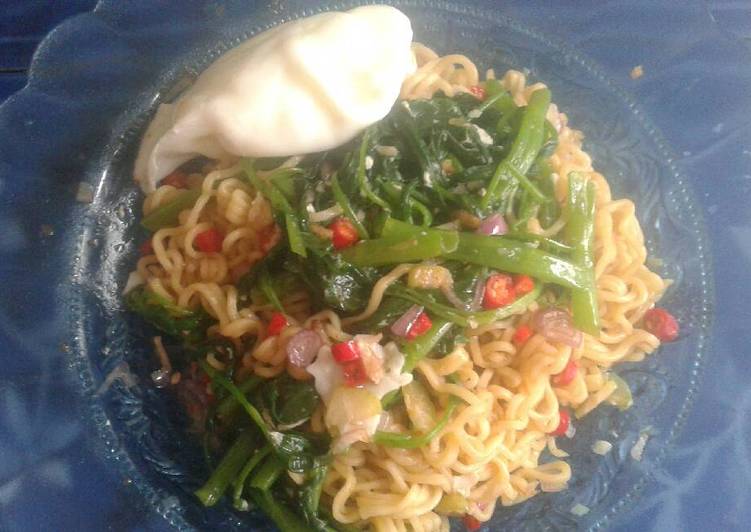 Bagaimana Membuat Mie goreng asam pedas yang Sempurna