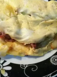 Una foto de Tortilla de aguacate y jamón