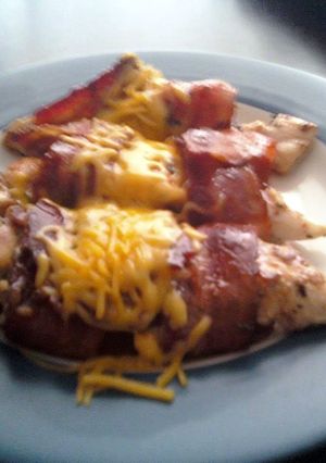 A picture of Candied bacon wrapped chicken.