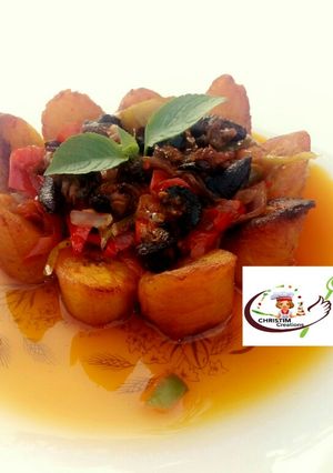 A picture of Fried plantain with periperi snail.