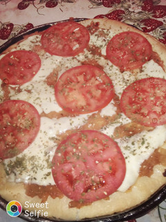 Una foto de Pizzas caseras