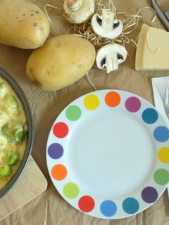 Una foto de Romanescu gratinado con bechamel de calabaza