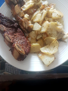 Una foto de Asado con papas al horno
