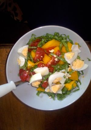 A picture of Mango, egg, lettuce salad.
