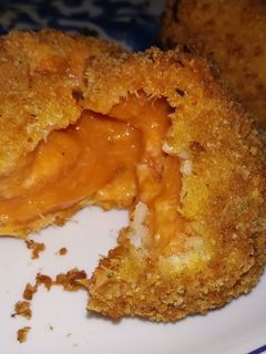 Una foto de Croquetas de bacalao al pisto