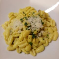 A picture of Fresh pasta with saffron and porcini.