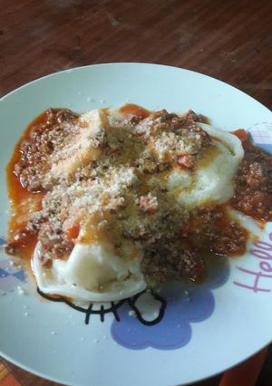 Una foto de Sorrentinos con tapa de empanada