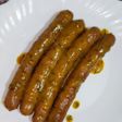 Salchichas con salsa de naranja