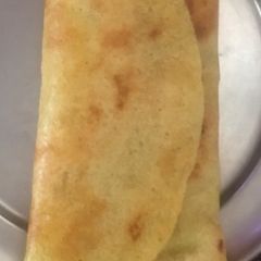 A picture of Paneer stuffed moong chila.